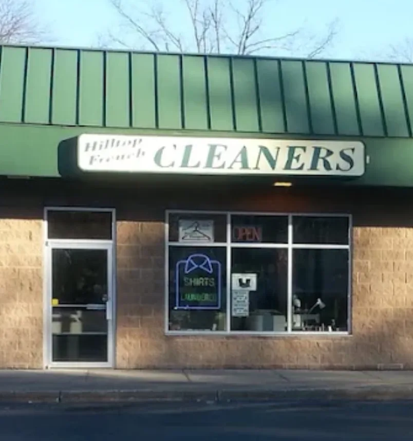Hilltop Cleaners storefront before styling